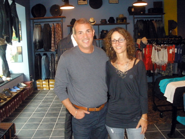 Denim Project Owners Sandy and Rick Owners Rich Lepowdsky, Sandy Dimperio pose proudly in their store.